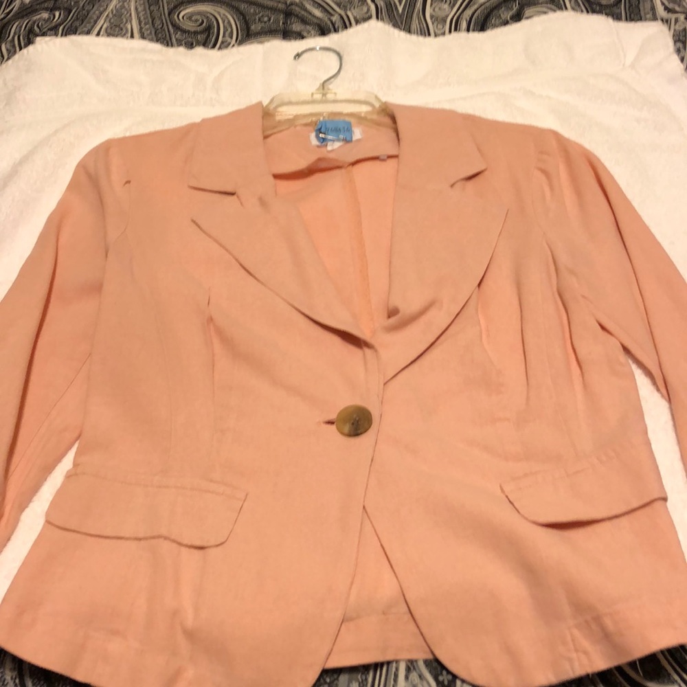 Ladies peach jacket.